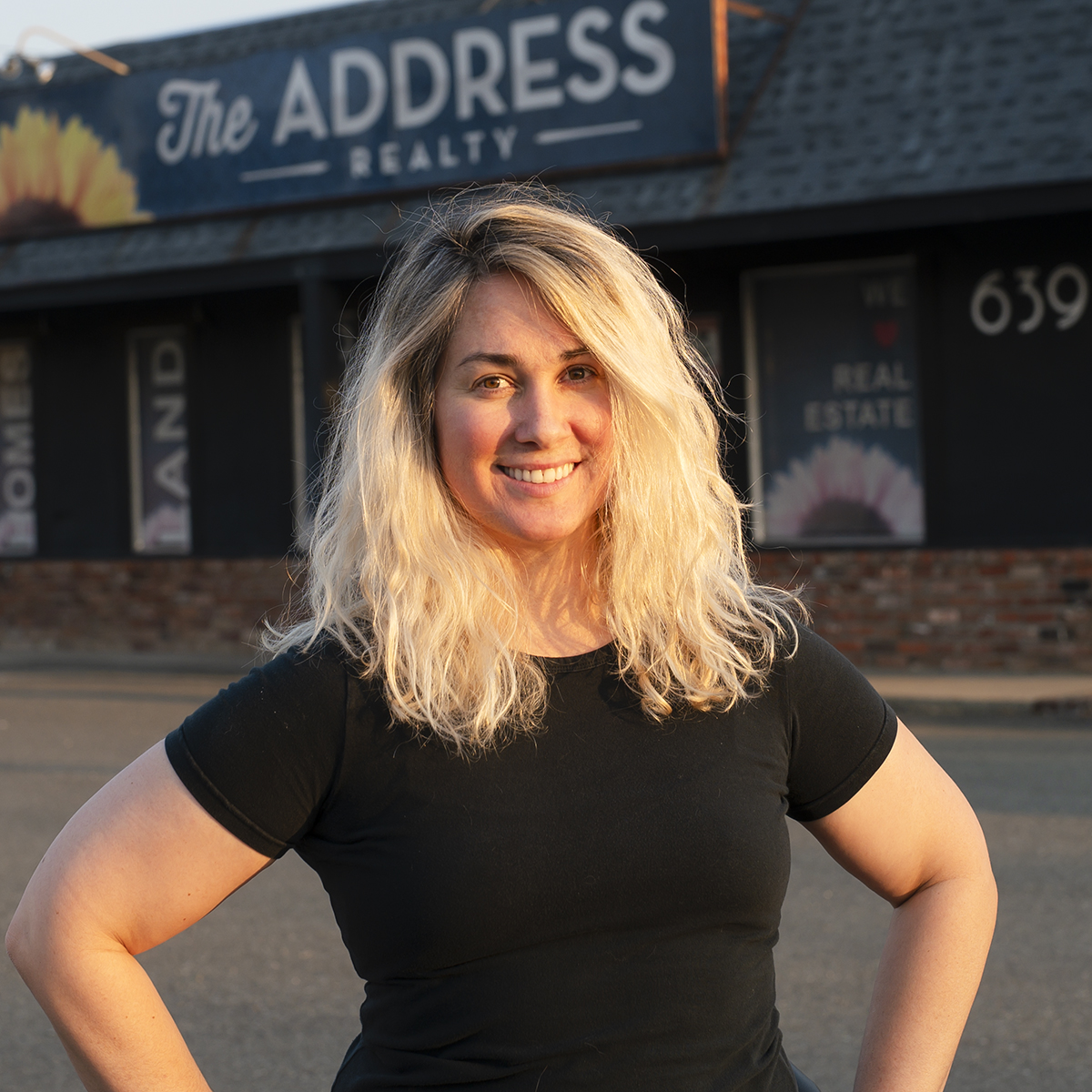 Erin Murphy, Broker for The Address Realty stands outside her office at 539 Lake Blvd in Redding CA